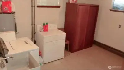 One of two community laundry rooms which could be converted to living space.