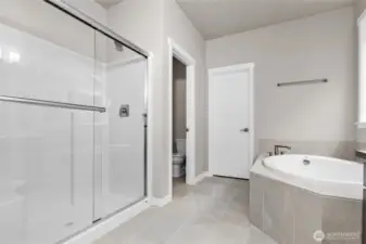 primary bath also comes with its own linen closet