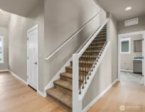 high end finishes like wood and metal railing on stairway