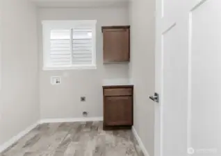 spacious laundry room with lots of natural light. Photo from similar plan on different lot, features may vary