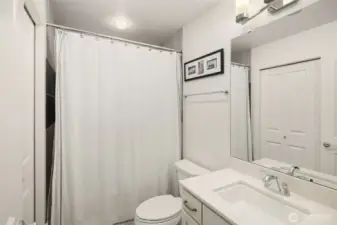 A full en-suite bathroom complements the room, providing a private and personal retreat.