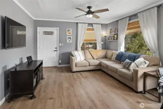 Living space opens to the front deck, great for BBQ's.