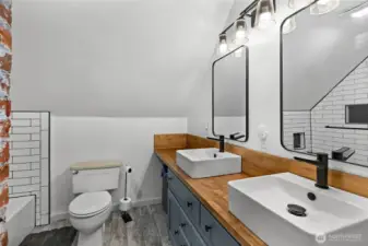 Upstairs Full bath with double sinks & cool wood counters.