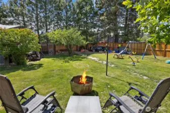 Outdoor living space galore! Also chicken coop is included. 1 OLD Italian Plum tree!