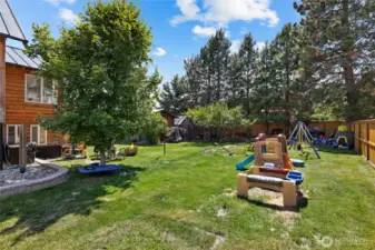 Next to chicken coop is a double gate large enough pull your boat, tractor, etc. into the property safely!