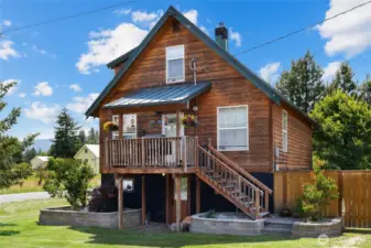 Built in 1900- oh the stories this place could tell! Loving new owners throughout time have contributed to this place. New windows. All new 120 electrical wiring in the 1990's, Beautiful cultured stone planter boxes.
