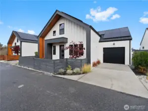 Oversized single car garage offers plenty of space for parking and additional storage/work space.