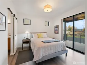 Main floor owner's suite overlooks the pond.