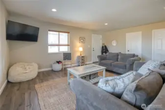 Spacious layout with abundant natural light and a neutral color palette throughout the living area.