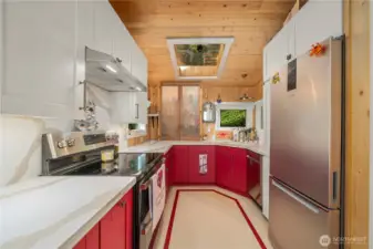 Prepare meals in a well-appointed kitchen with ample workspace.