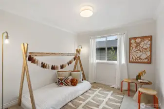 3rd upper level bedroom with new wall-to-wall carpeting and lighting.