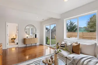 Lower level rec room connects beautifully via the new sliding glass door to the fenced backyard.