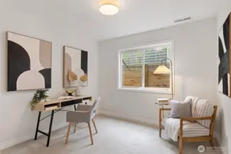 5th lower level bedroom features new wall-to-wall carpeting and lighting.