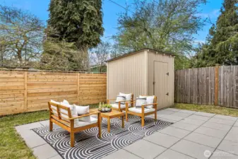 Enjoy the fenced backyard with huge patio for entertaining and relaxing.