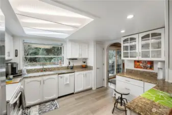 Beautiful kitchen with many upgrades.  Garden window is perfect space for small indoor herb garden. Lower cabinets have pull out shelves for easy access ot contents.