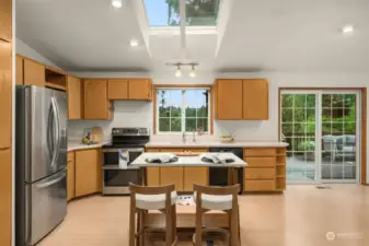 Spacious kitchen with skylight.