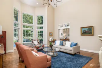 This formal living area is the center of the main floor and looks out over the private backyard.