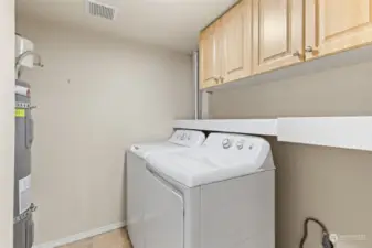 Oversized Laundry Room offers additional cabinet space