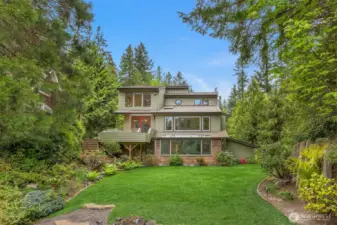 View from the water of th backside of the home