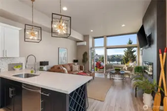 The family room and kitchen are located off the waterside deck.