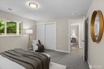 Primary bedroom closet offers great storage space.