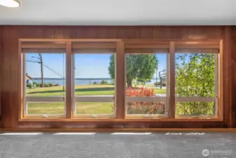 Updated windows with wood blinds throughout