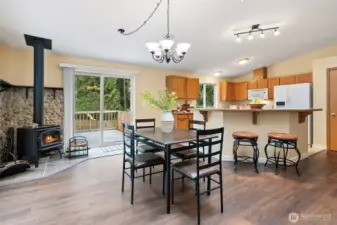Wonderful open kitchen concept with wood burning fireplace.