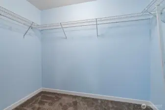 Walk in closet with hidden crawl space for lots of extra storage.