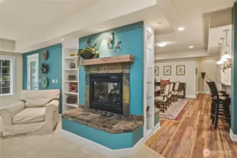 Gas Fireplace is Open to Living Area and Dining Area