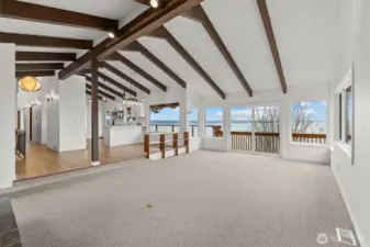 Upper livingroom with soaring high vaulted ceilings