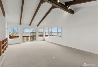 Sunken Livingroom with slider to back deck.