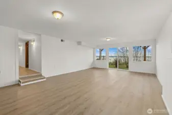 Huge downstairs familyroom with back patio access.