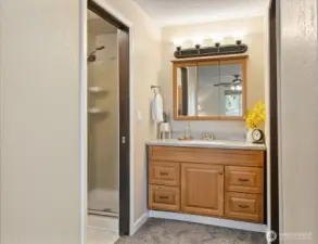 Primary room sink. Doors leads to bathroom and closet.