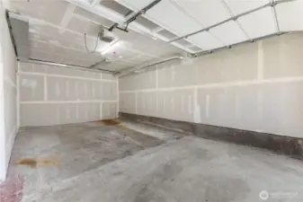 Large garage with opener.