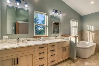 Primary Bathroom double sinks and spa bathtub