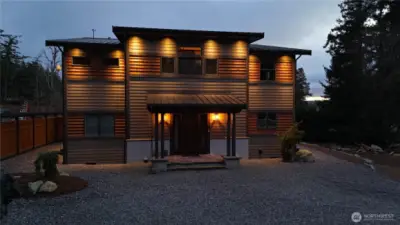 Soffit lighting 744 Crescent Beach at dusk.