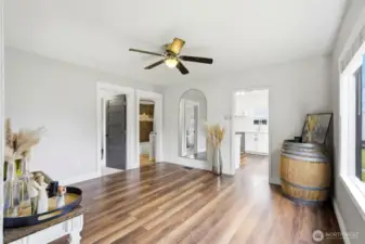 Open space connecting all of the rooms and kitchen