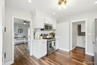 View looking at living space and entry to laundry room