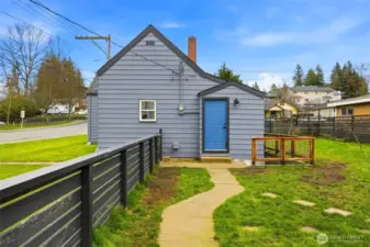 Backdoor to the backyard, shop and parking