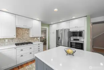 Large island and plenty of counter space in the remodeled kitchen.