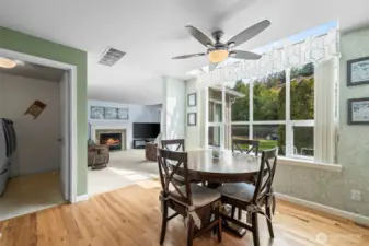Casual dining room looks out to the backyard.