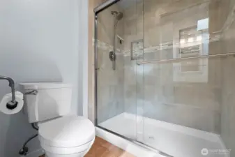 Private water closet & walk-in shower in Primary Bathroom.