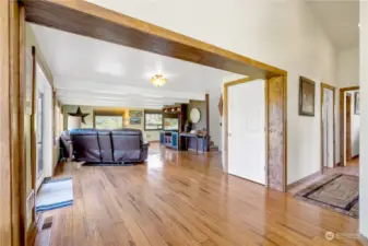 Local milled wood throughout the home.  This entrance way is from some of the most desired Maple hardwood known in the PNW. It was used throughout the home.