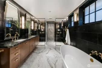 Winner of the 2023 Luxe Interiors + Design Excellence Award, the En Suite Bath on Level 1 envelops you in Nero Marquina marble, veined stone, and glints of brass. A freestanding soaking tub, double vanity, and expansive glass shower offer a spa experience that rivals five-star hotels—right at home.