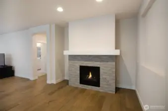 Cozy gas fireplace with sitting nook, perfect for days you want to cuddle up with a good book.