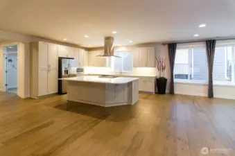 Who wouldn't want to cook in this gourmet kitchen.   Plenty of room for additional seating.  Notice added storage underneath.