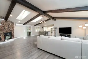 Skylights & Vaulted ceilings with gorgeous exposed beams in Main Living Area