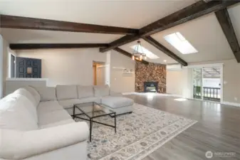 Skylights & Vaulted ceilings with gorgeous exposed beams in Main Living Area