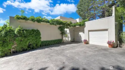 Plenty of parking outside and oversized two-car garage connected to the home with plenty of storage area.