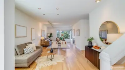Home features soaring ceilings, oversized windows, and flexible living spaces filled with natural light.